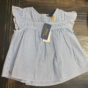 Girls size 7 Polo Ralph Lauren seersucker blue and white striped top.